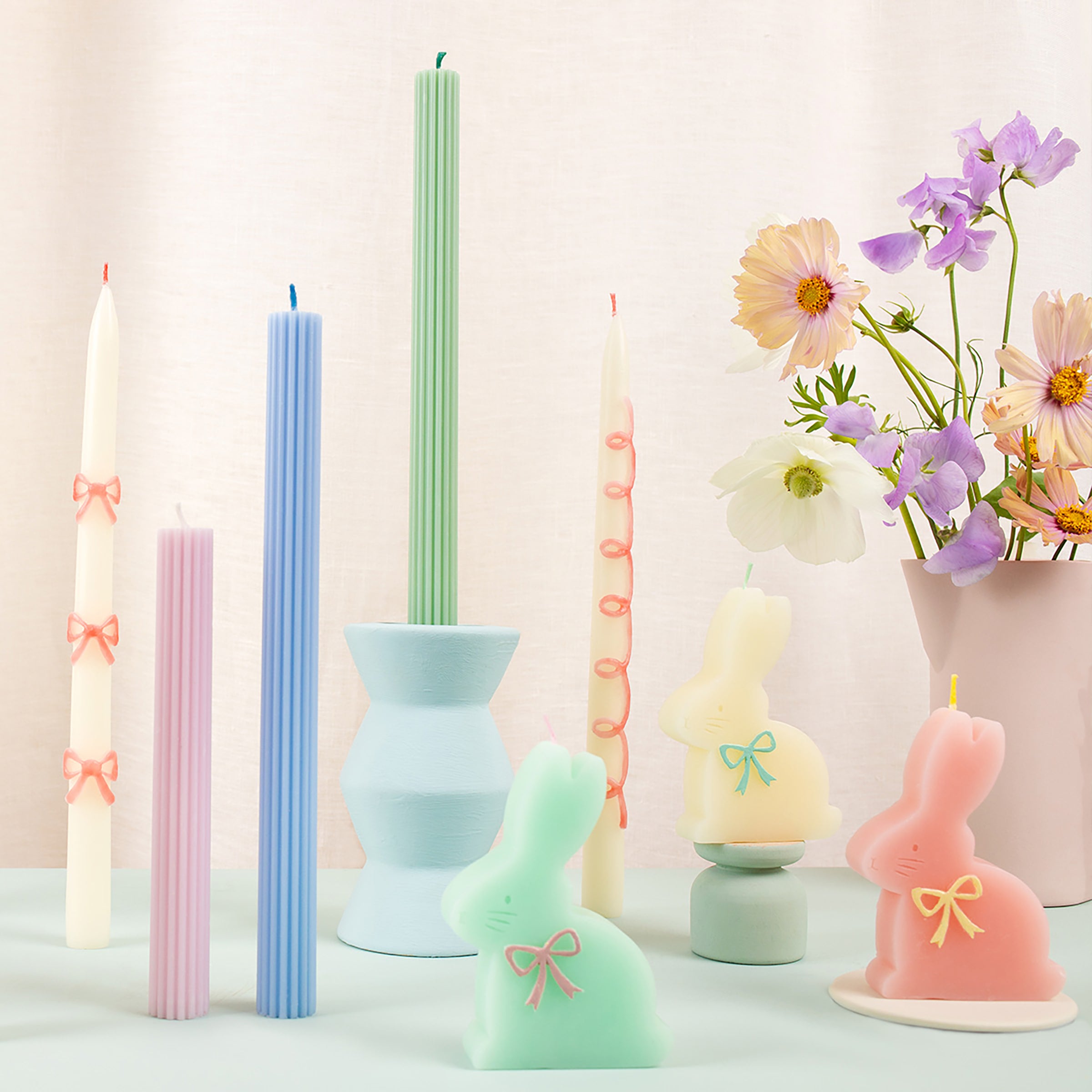 Our party candles feature handpainted pink bows and pretty pink wicks.