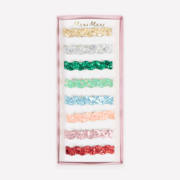 Our glitter hair clips, in a set of 8 vibrant colors, are perfect as Christmas gits, party favors or stocking stuffers. Image1