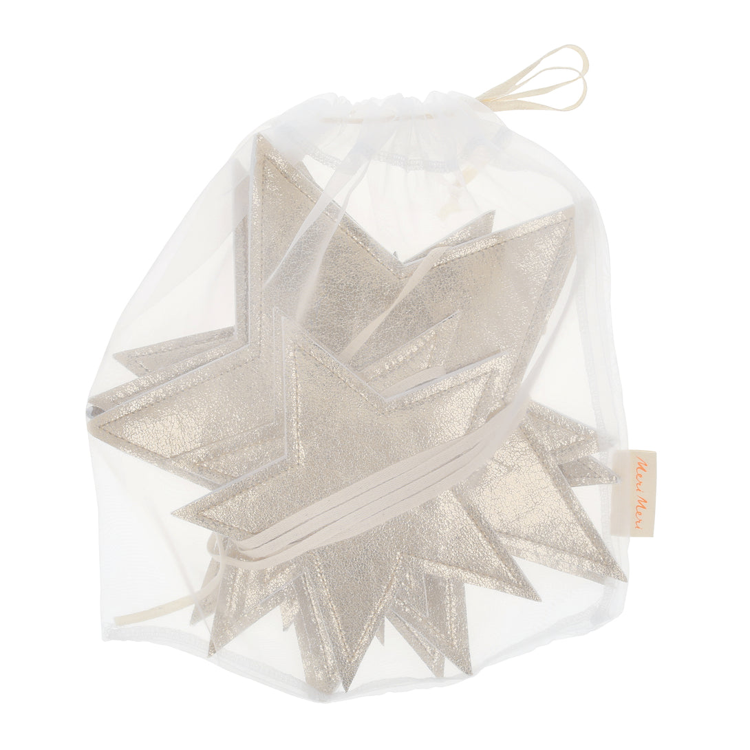 Our gold garland, with sparkling faux leather stars, adds shimmer and shine to any celebration. Image5