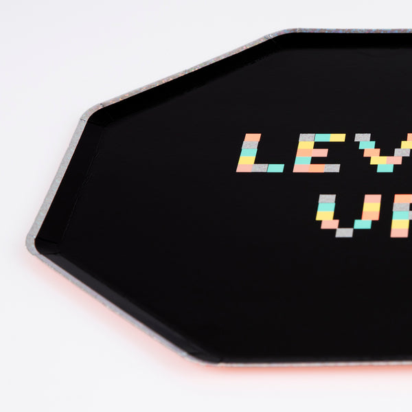 Our dinner plates are designed for a retro party for gamers, with lots of holographic silver foil, neon colors and an octagonal shape. Image3