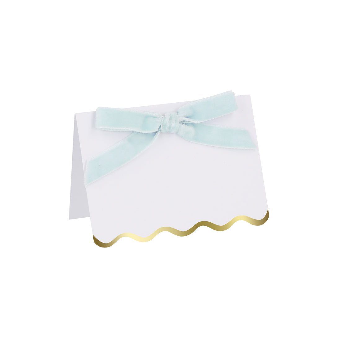 Use our luxury place cards with velvet bows in pastels colors, and shiny gold foil scalloped borders, for special meals like baby showers.