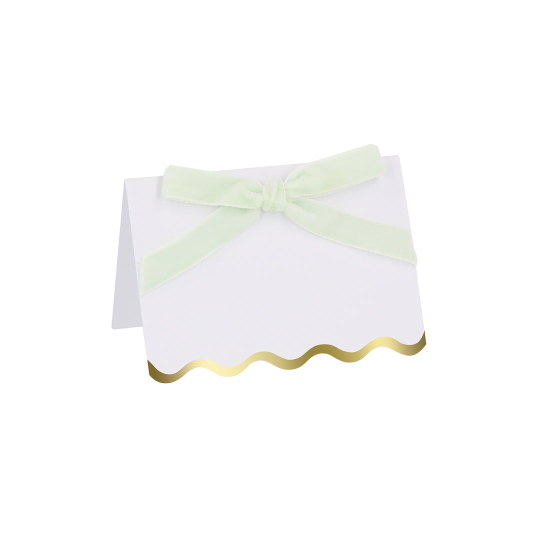 Use our luxury place cards with velvet bows in pastels colors, and shiny gold foil scalloped borders, for special meals like baby showers.