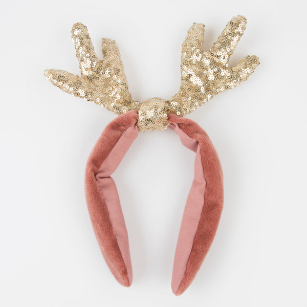 Make your Christmas hair look amazing with our antler headband, made with soft velvet and a sequinned gold fabric material.