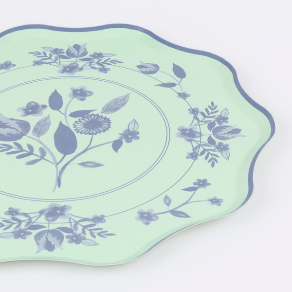 Our paper plates feature four pastel shades with cobalt blue botanical illustrations, ideal as bridal shower plates or for any grown up dinner. Image3
