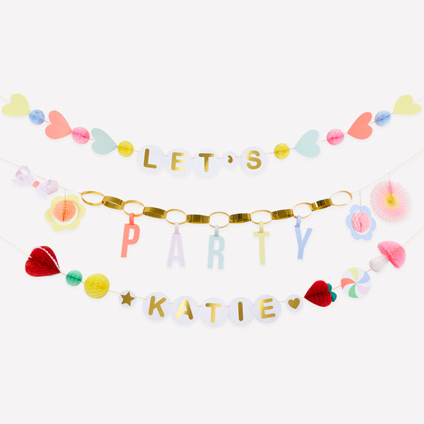 Our party garland features 3 garlands, with a section to personalize the birthday girl or boy's name, perfect to add to your birthday party decor. Image1