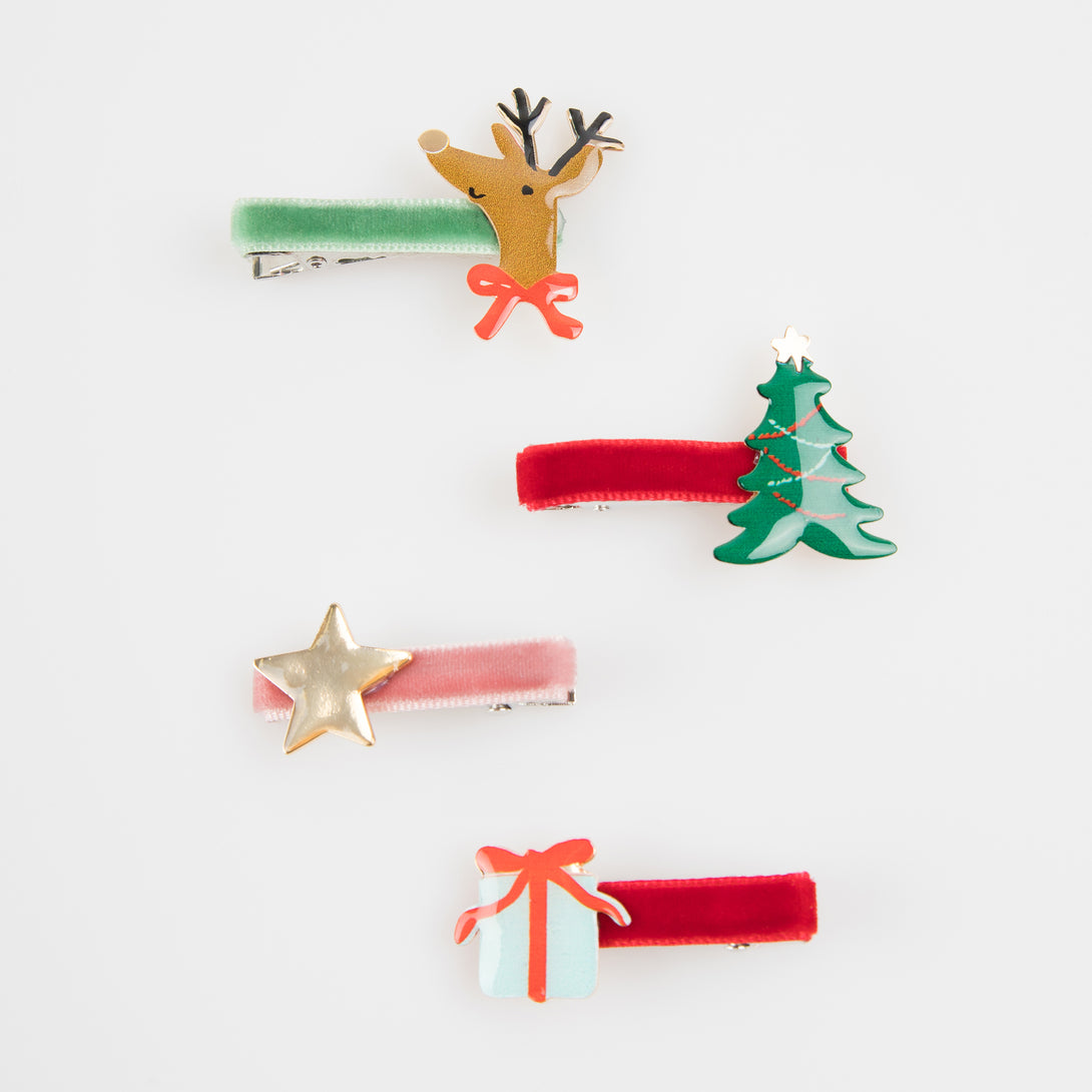 Make your Christmas hairstyles look amazing with our special hair clips featuring Christmas icons, made in enamel, with velvet ribbons.