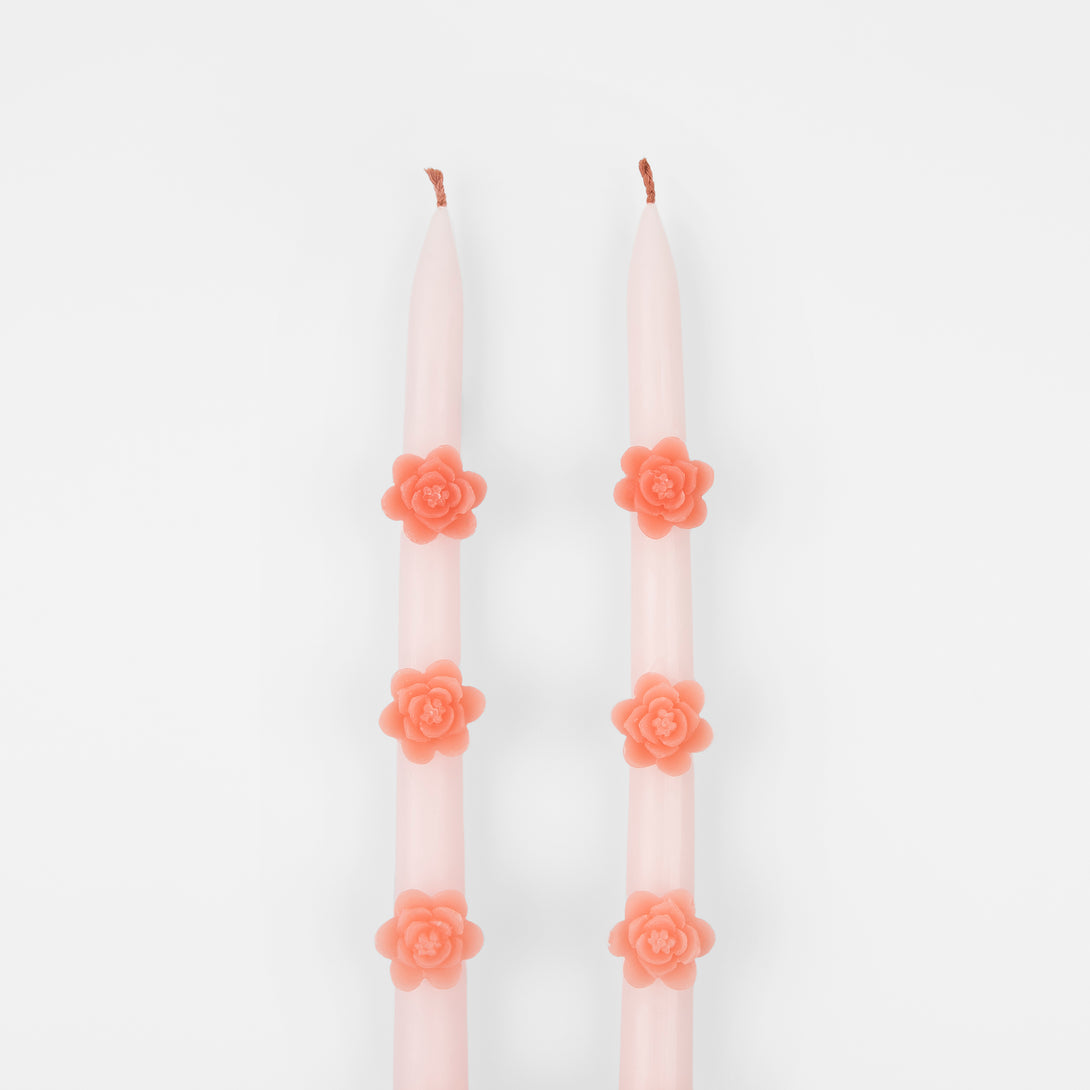 Make any pink party look amazing with our taper candles with pink flowers and pink wicks.