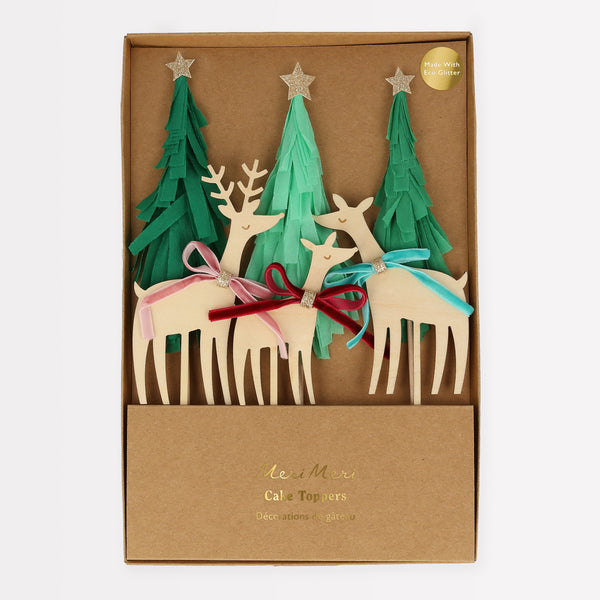 Our Christmas cake toppers, with wooden reindeer and paper Christmas trees will make your festive cakes look amazing.