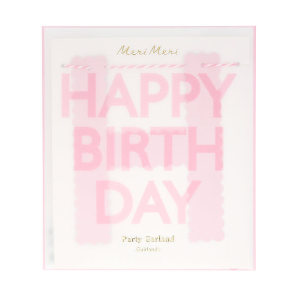 Our pink garland, made with scalloped pink paper, is a pretty decoration for a birthday party. Image3