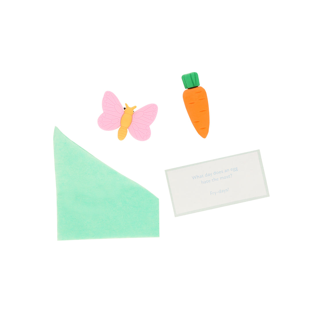 Our party crackers are crafted in the shape of bunnies, and contain mint tissue paper hats, erasers and a joke.