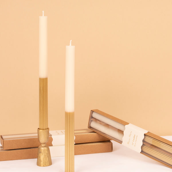 Our gold candles, with an ivory top and gold dipped base, make a wonderful table centerpiece or decoration.