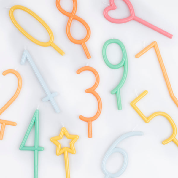 Add decoration, and numbers, to a birthday cake with our number candles in soft colors. Image3