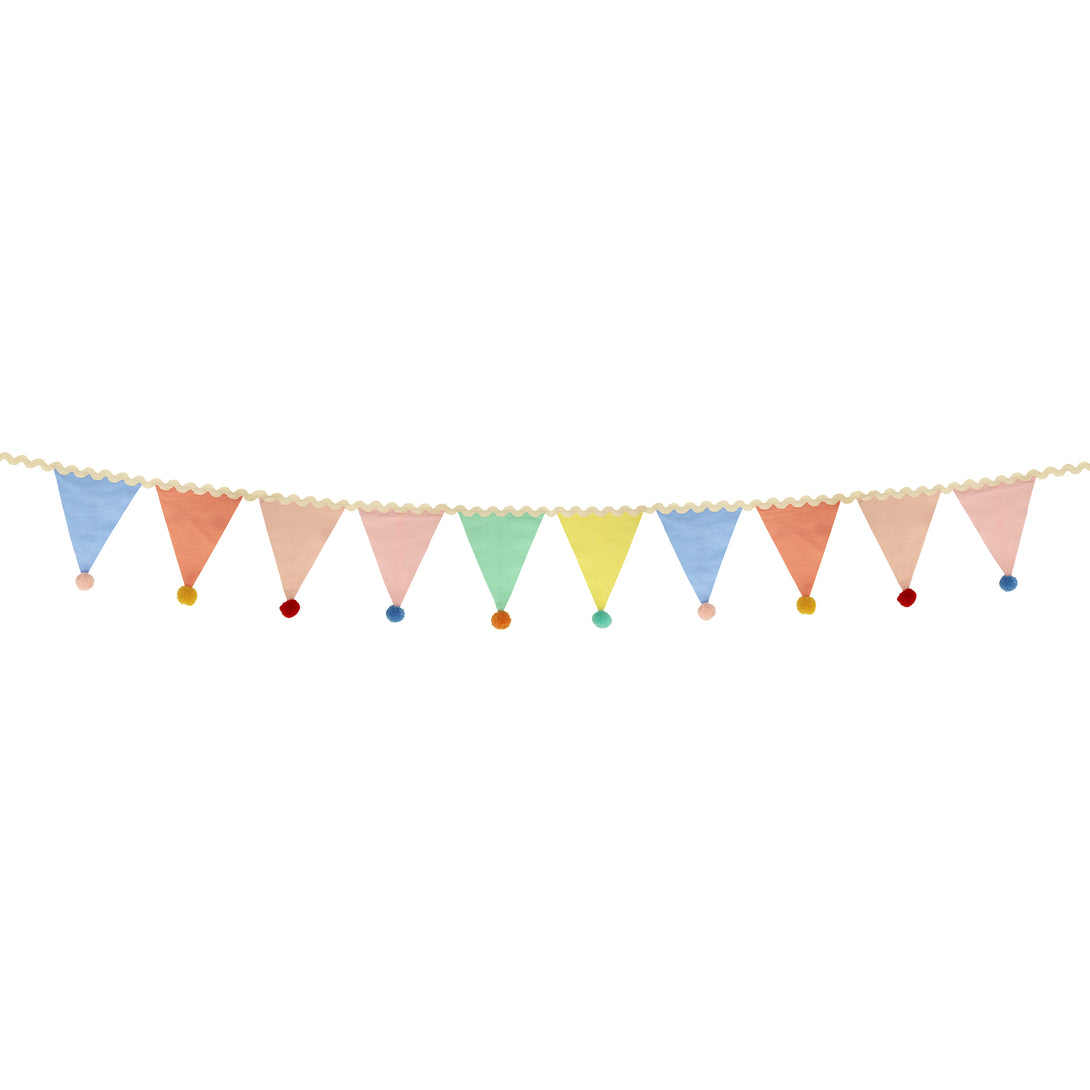 Add a pop of pastel color to your party table or wall with our flag garland with pompoms.