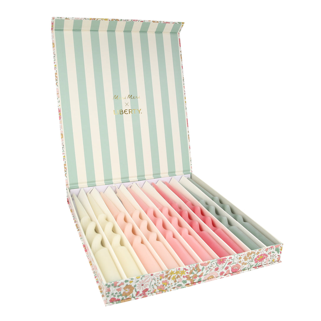 Our candle gift box includes 10 table candles in 5 soft colors, all beautifully presented in a Liberty print floral box.