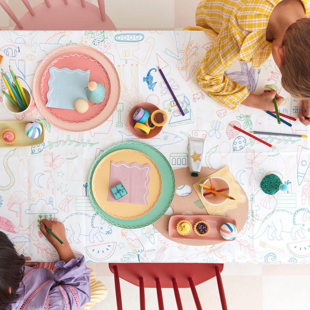 Our paper tablecloth, will illustrations for kids to color in, is great to add to your birthday party supplies.