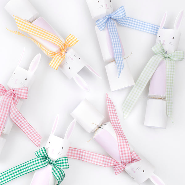 Our party crackers are crafted in the shape of bunnies, and contain mint tissue paper hats, erasers and a joke. Image5