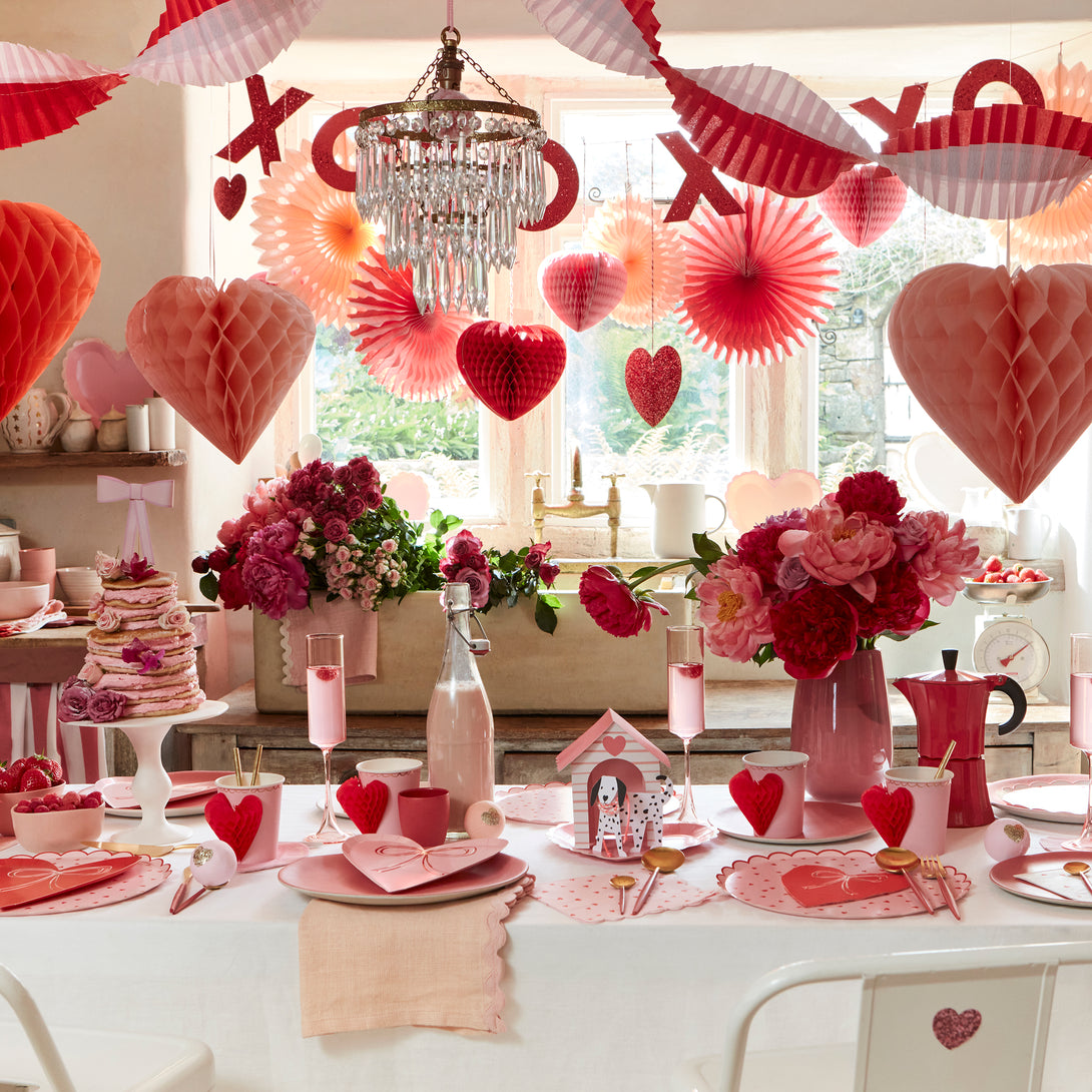 Our pink cups, with honeycomb red hearts, are the perfect party cups for Valentines.