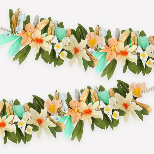 Our beautiful paper flower garland is made with crepe paper flowers and leaves and has a gorgeous gingham ribbon. Image1