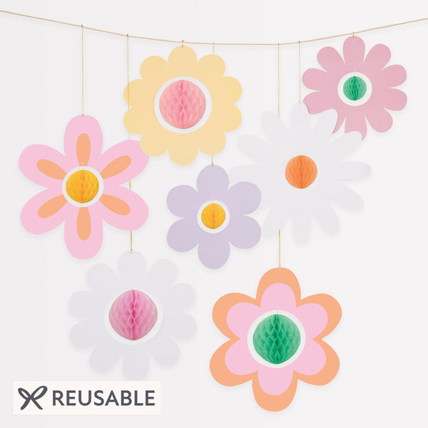 Our flower hanging decorations, with 3D honeycomb centers, are perfect for a pink party, groovy party or summer party Image1