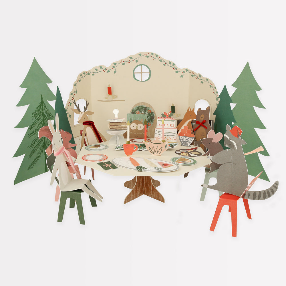 Paper animals around a tea party table