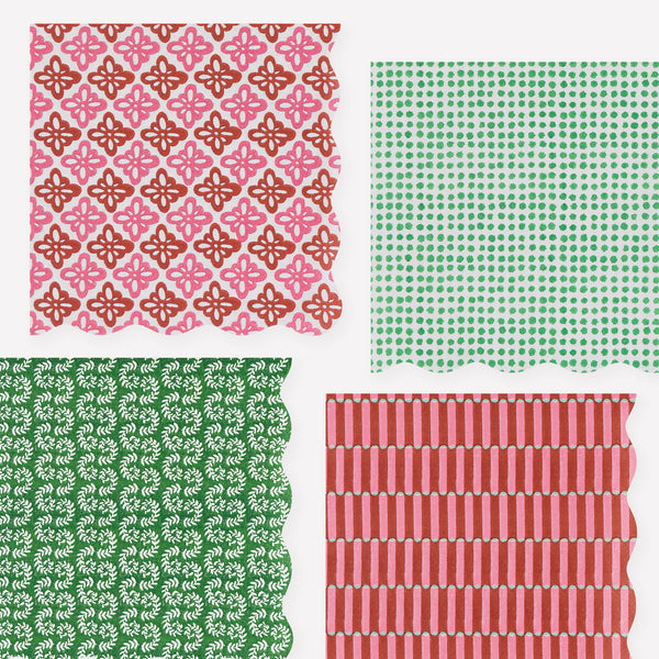 Our Christmas paper napkins, in a large size, feature Molly Mahon block print designs in seasonal colors with wavy edges for a stylish look. Image1