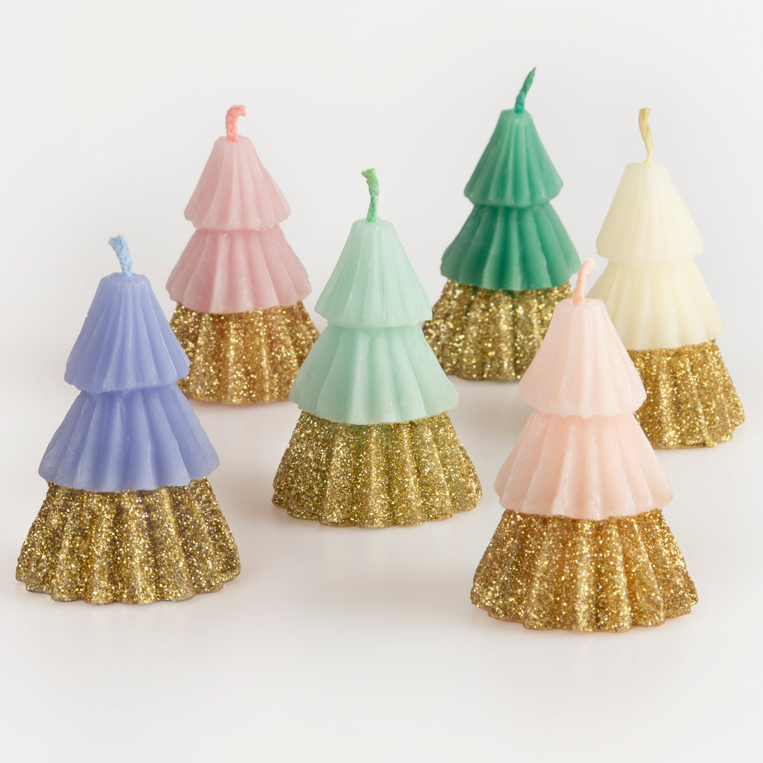 Our Christmas candles, in the shape of Christmas trees, are colorful and glittery, are perfect as a host gift.