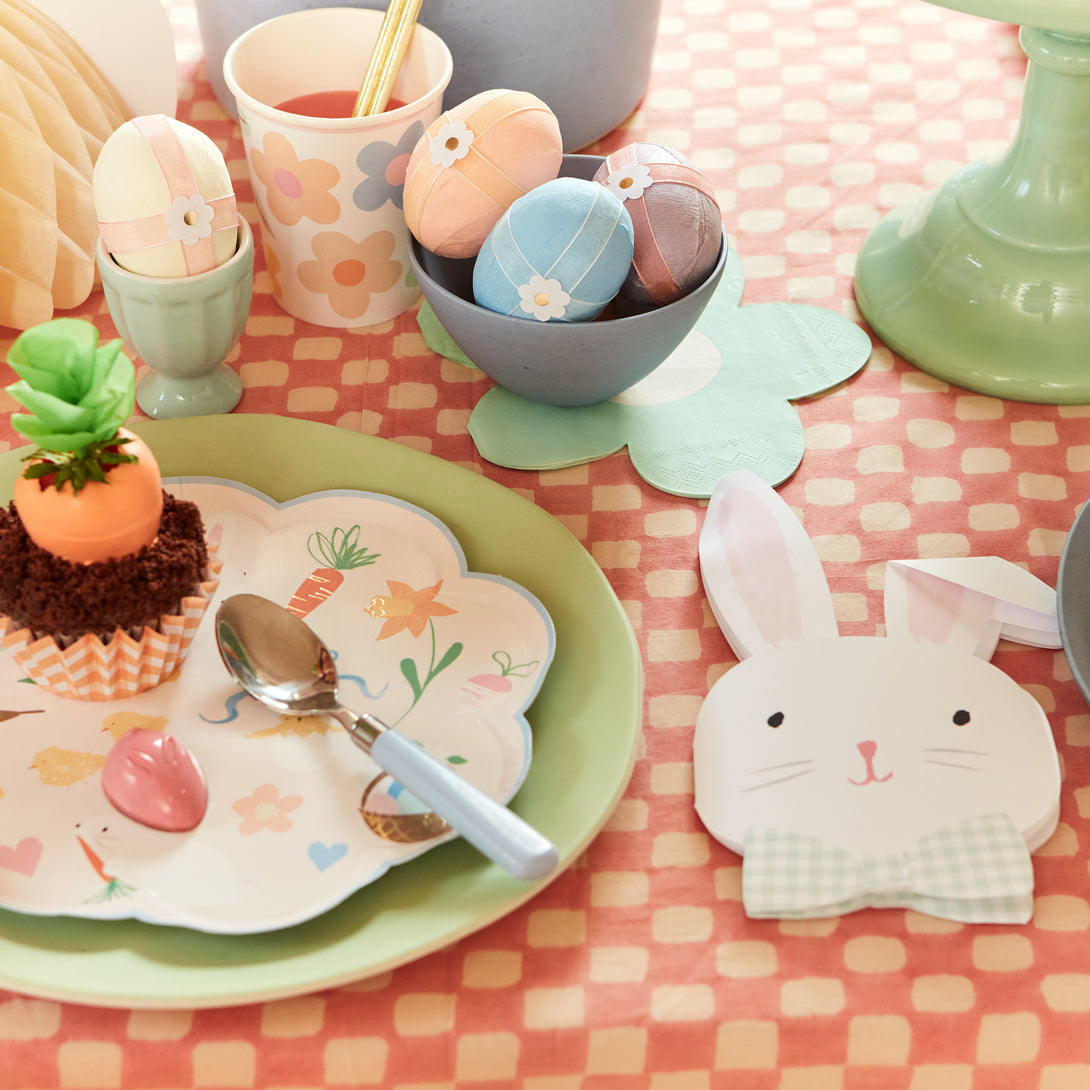 Our Easter party napkins, in the shape of the a bunny, feature on-trend gingham bows.