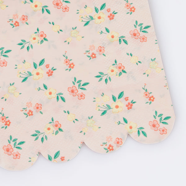 Our paper guest towels feature a ditsy floral pattern in 4 vintage color ways of pink napkins, mint napkins,, blue napkins, and peach napkins. Image2