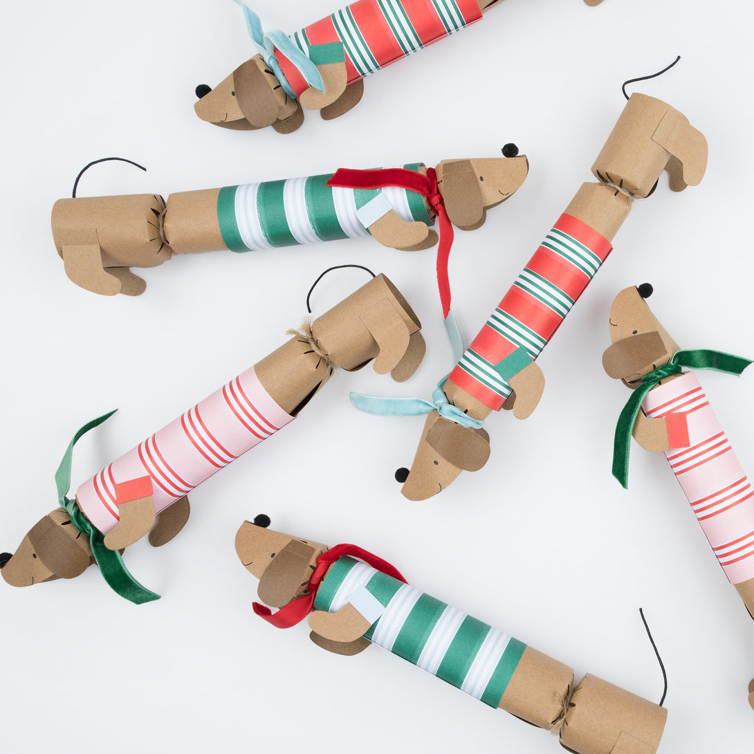 Our sausage dog Christmas crackers are utterly charming, and each contain a paper hat, joke and a sausage dog pin badget.