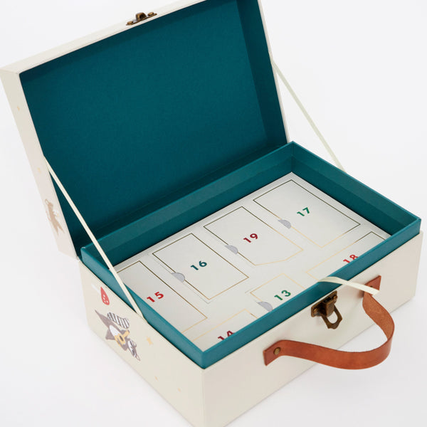 Our kids advent calendar, in a suitcase, features wooden toys for hours of play. Image6