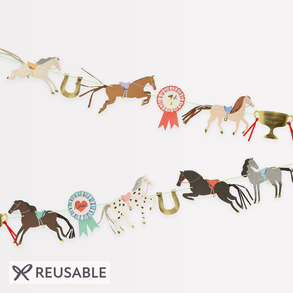 Our party garland is ideal for a horse party or a horse decoration, as it features horses, rosettes and shiny gold horseshoes. Image1