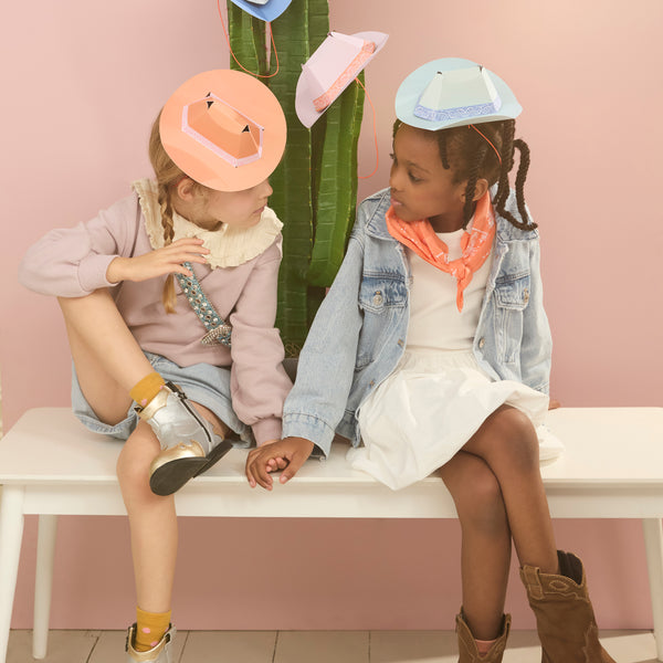 Our mini party hats are made in the shape of Western hats, crafted from paper in 8 fabulous colors. Image2