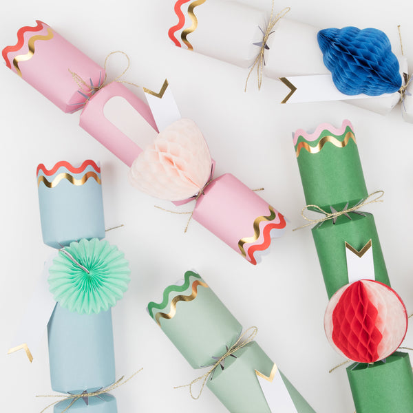 Our Christmas crackers have gift tags and fun honeycomb embellishments, and contain a joke, party hat and toy. Image4
