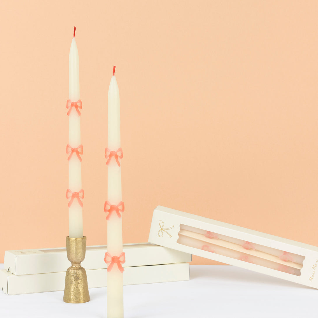 Our party candles feature handpainted pink bows and pretty pink wicks. Image1