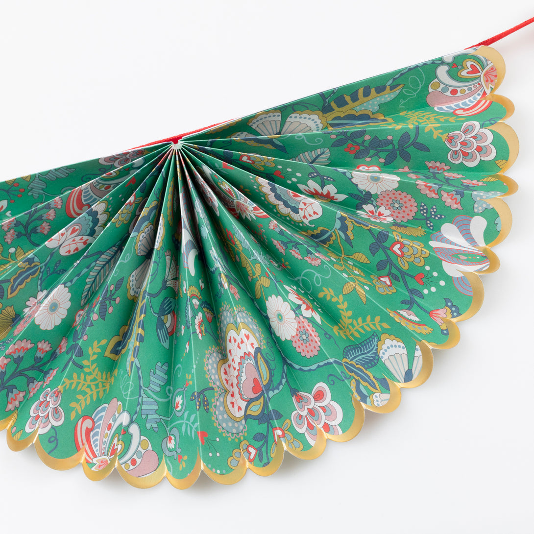 Our elegant Christmas garland has Liberty prints and matte gold foil details, pre-threaded on to a stylish red velvet ribbon. Image4