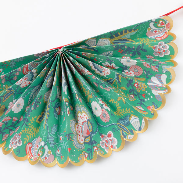 Our elegant Christmas garland has Liberty prints and matte gold foil details, pre-threaded on to a stylish red velvet ribbon. Image4