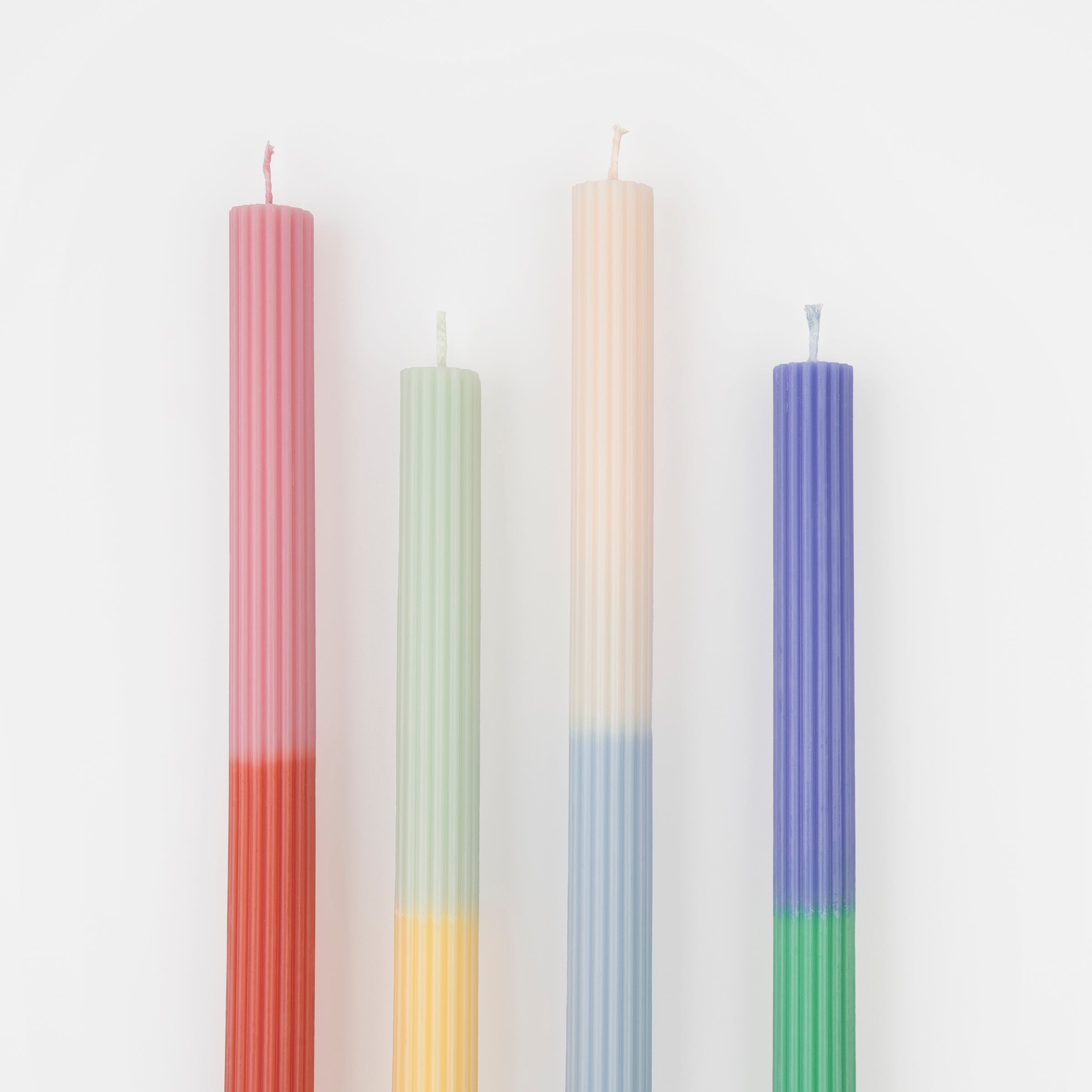 Our table candles are colorful and will look amazing as party table decorations.