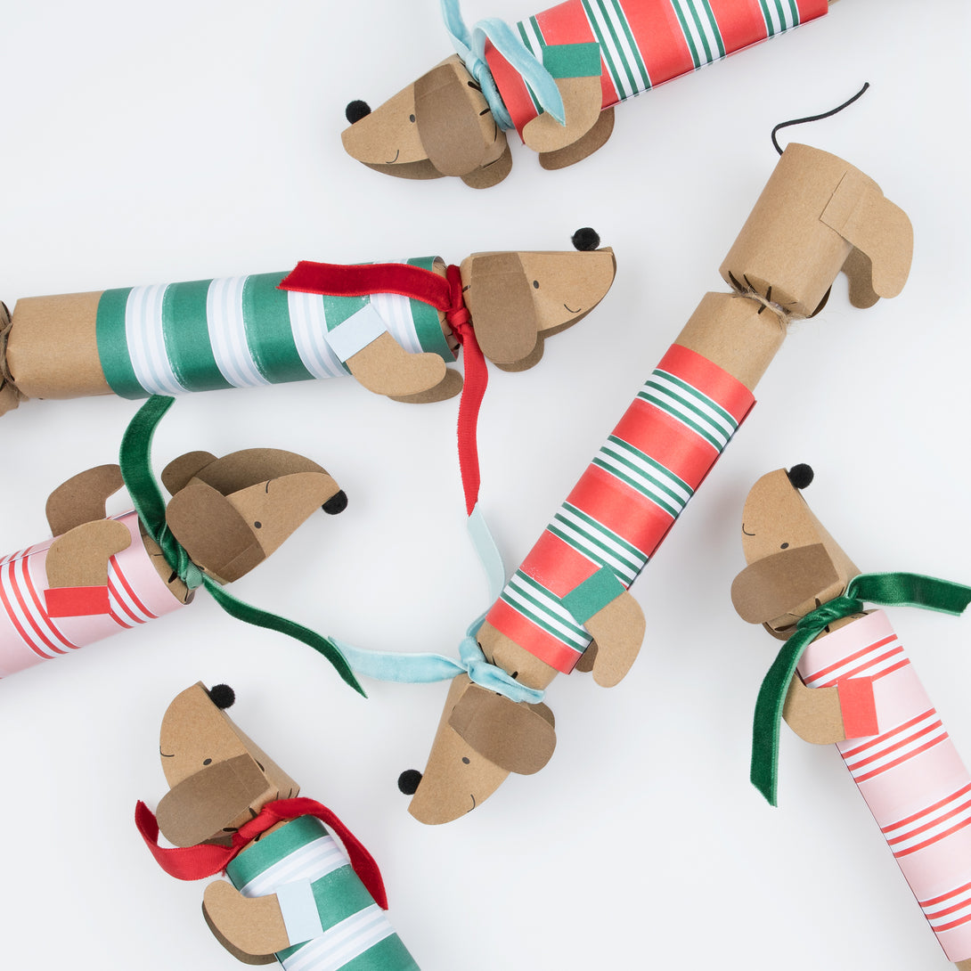 Our sausage dog Christmas crackers are utterly charming, and each contain a paper hat, joke and a sausage dog pin badget.