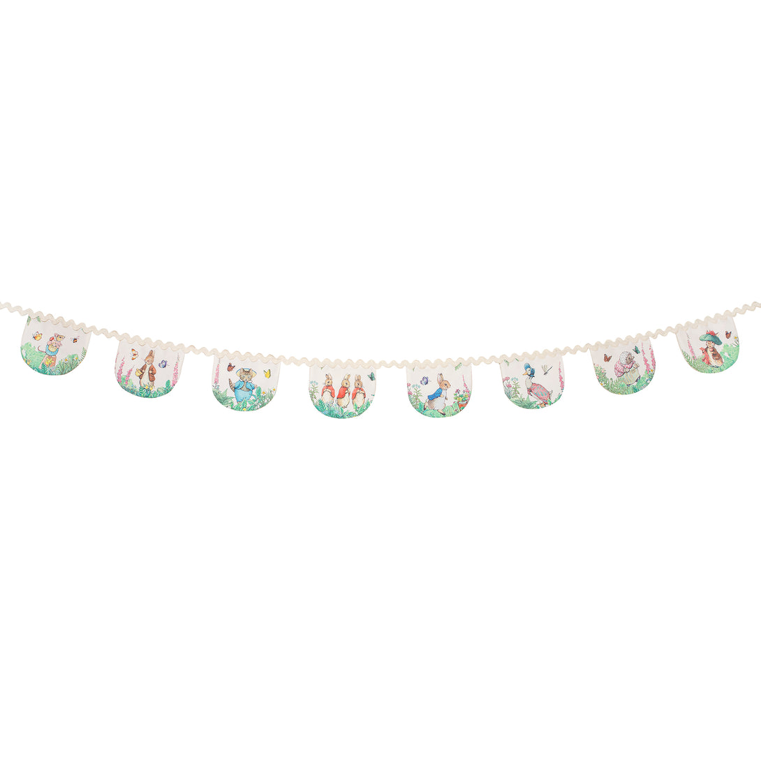 Our Peter Rabbit garland, crafted from fabric, is perfect as a baby shower garland or first birthday garland.