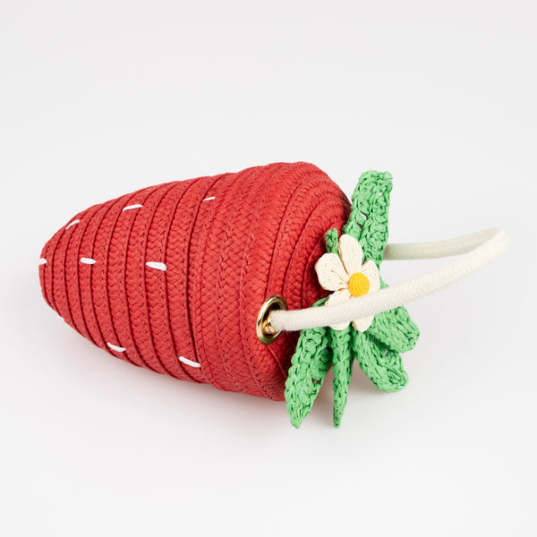 Our strawberry bag, with a pretty gingham lining, is crafted from sturdy paper and features delightful leaf, flower and seed embellishments. Image3