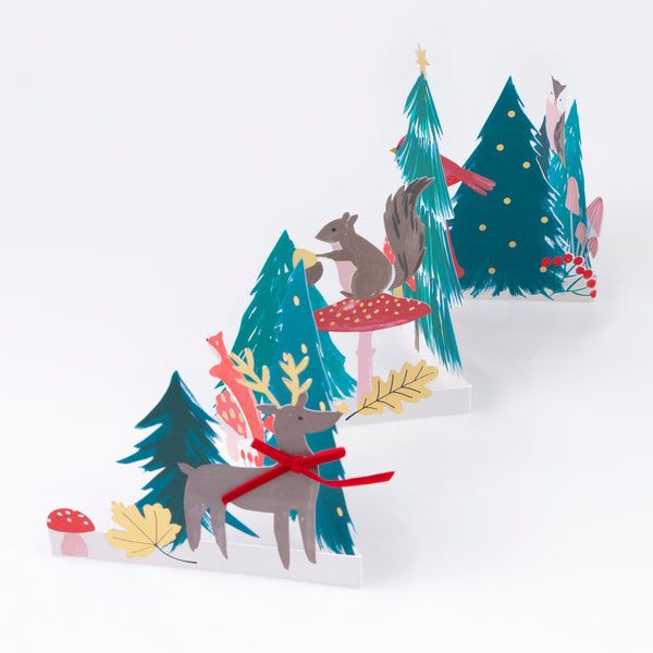 Send your Christmas and New Year best wishes in style with our special concertina Christmas card featuring a wintry woodland scene.