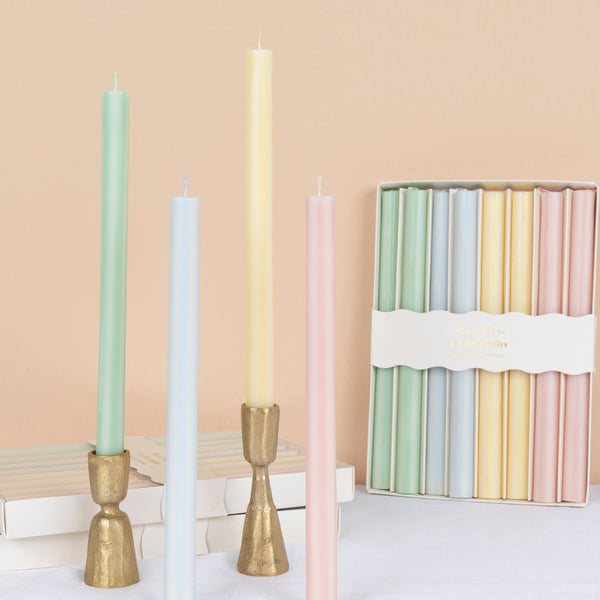 Our striped candles, with pastel stripes in pink, blue, yellow and green, make elegant table candles for any special party or meal. Image1