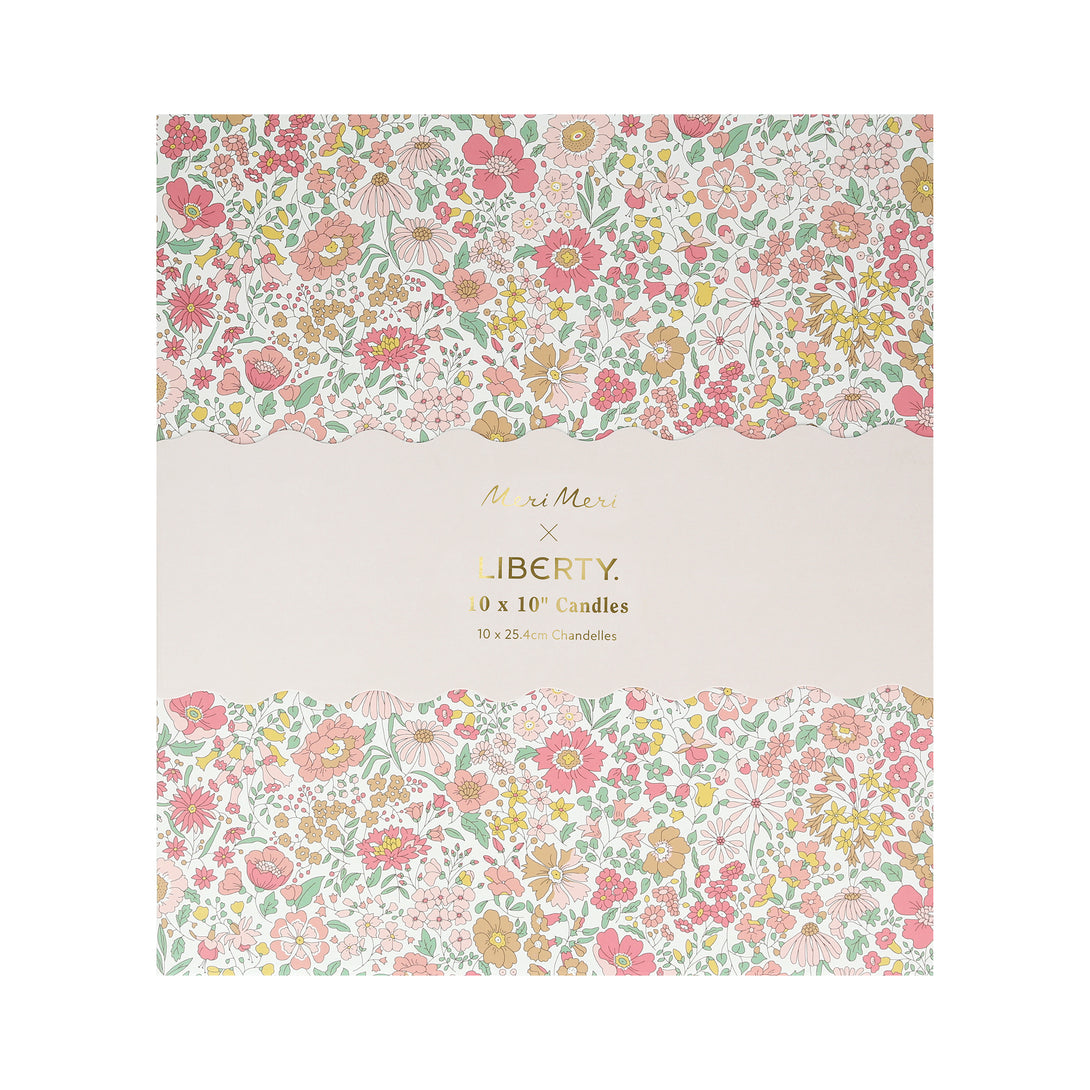 Our candle gift box includes 10 table candles in 5 soft colors, all beautifully presented in a Liberty print floral box.