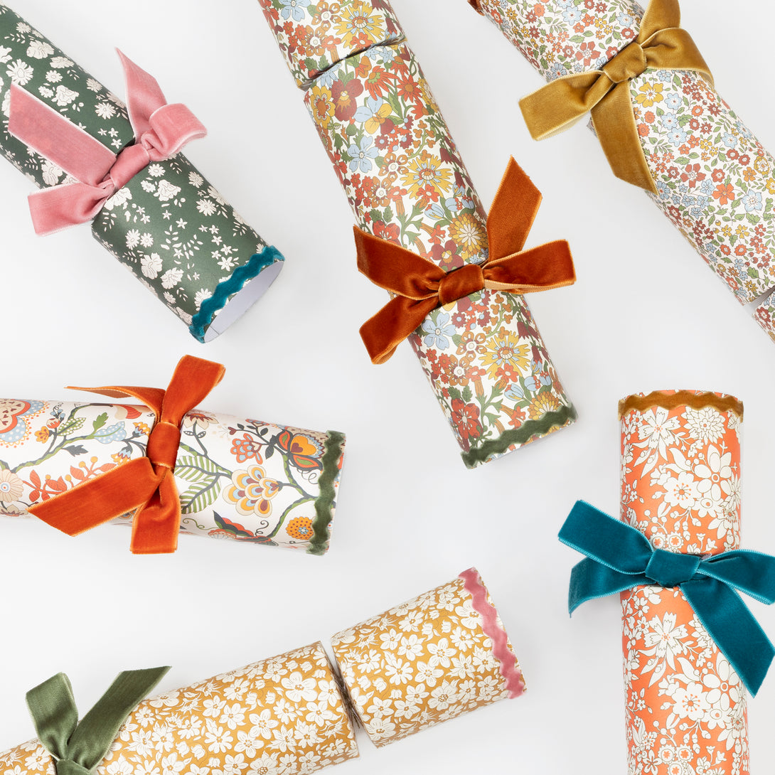 Our Thanksgiving party crackers feature Liberty floral prints, velvet bows and ric rac, containing a wooden brooch or keyring, party hat and joke. Image4