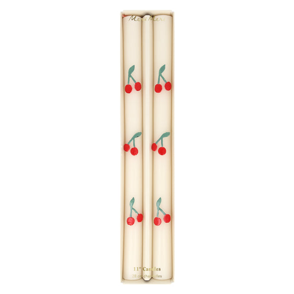 These table candles, with colored wicks and cherry details, are ideal as a host gift or when you're looking for decorative candles. Image5