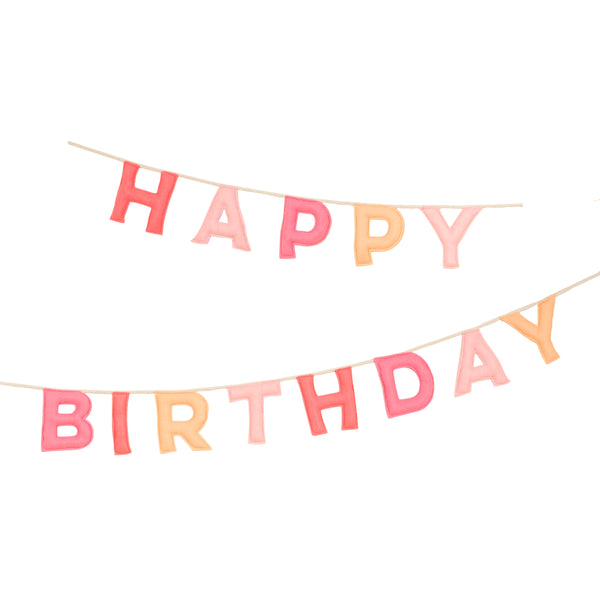 Our happy birthday garland has felt letters in peach and pink tones, ideal to reuse year after year.