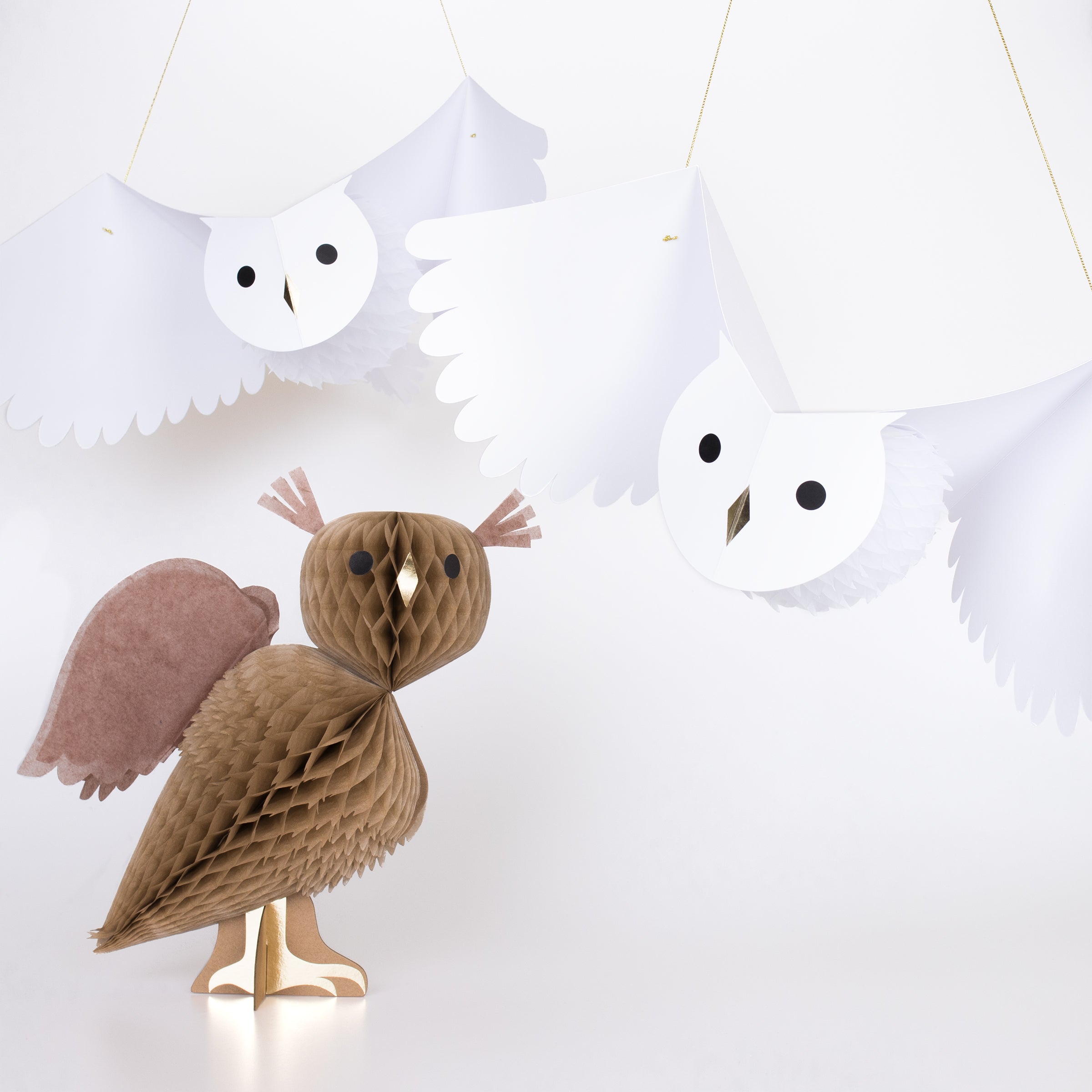 Our paper owls make the perfect hanging decorations to add to your Halloween party supplies, or for a wizard birthday party.