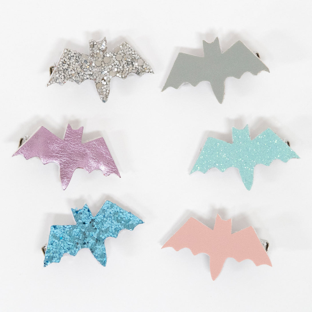 Our terrific Halloween hair clips feature bats crafted from glitter, leatherette and suedette.