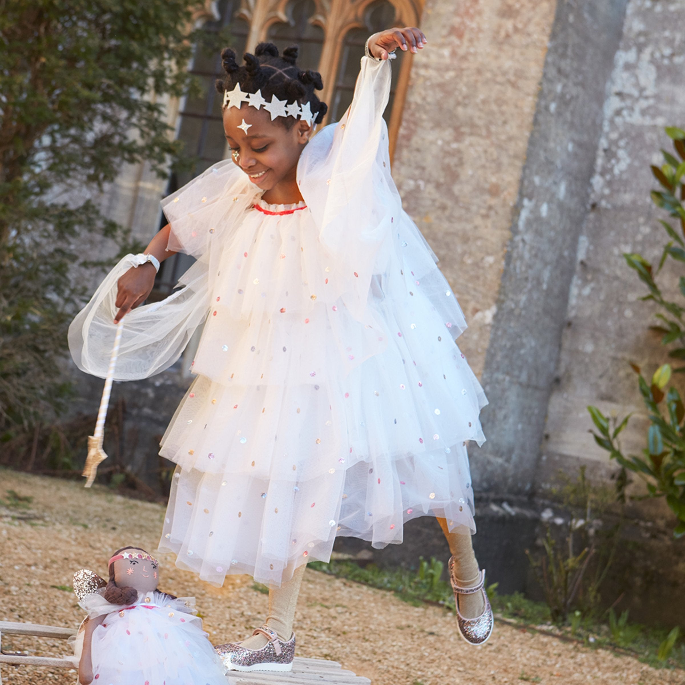 Our angel costume for kids includes a dress, wings and star headband.