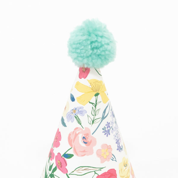 Make your party guests look amazing with our paper hats with floral designs and bright pompoms. Image2